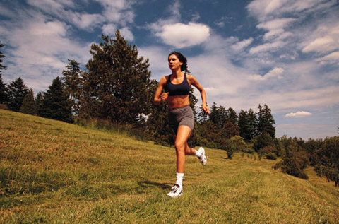 Woman-running-in-field
